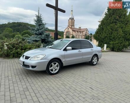Сірий Міцубісі Lancer, об'ємом двигуна 1.59 л та пробігом 205 тис. км за 4350 $, фото 1 на Automoto.ua