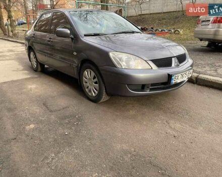 Серый Мицубиси Лансер, объемом двигателя 1.58 л и пробегом 252 тыс. км за 4799 $, фото 1 на Automoto.ua