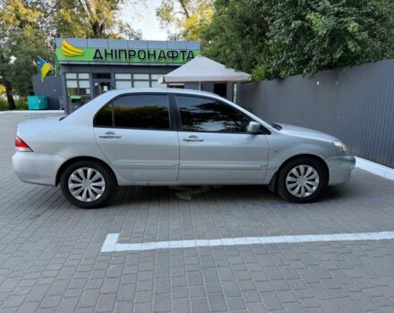 Серый Мицубиси Лансер, объемом двигателя 1.6 л и пробегом 298 тыс. км за 3500 $, фото 1 на Automoto.ua