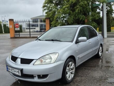 Сірий Міцубісі Lancer, об'ємом двигуна 1.6 л та пробігом 187 тис. км за 3999 $, фото 1 на Automoto.ua