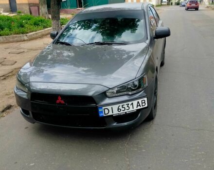 Серый Мицубиси Лансер, объемом двигателя 2 л и пробегом 355 тыс. км за 7000 $, фото 1 на Automoto.ua