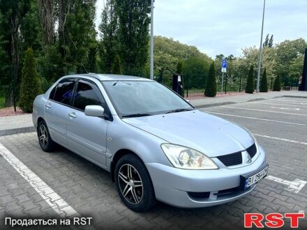 Сірий Міцубісі Lancer, об'ємом двигуна 1.6 л та пробігом 220 тис. км за 4200 $, фото 1 на Automoto.ua