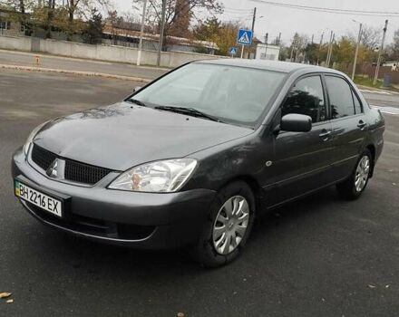 Сірий Міцубісі Lancer, об'ємом двигуна 1.6 л та пробігом 181 тис. км за 4500 $, фото 1 на Automoto.ua