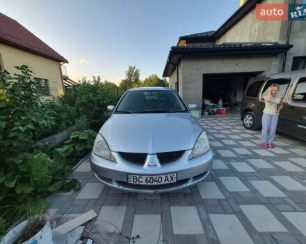 Серый Мицубиси Лансер, объемом двигателя 1.6 л и пробегом 388 тыс. км за 2950 $, фото 1 на Automoto.ua
