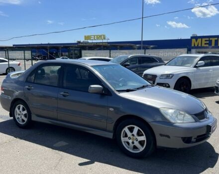 Сірий Міцубісі Lancer, об'ємом двигуна 1.6 л та пробігом 130 тис. км за 3999 $, фото 1 на Automoto.ua