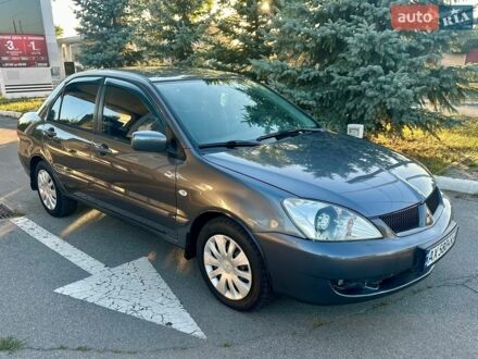 Сірий Міцубісі Lancer, об'ємом двигуна 1.6 л та пробігом 176 тис. км за 3650 $, фото 1 на Automoto.ua
