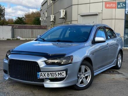 Серый Мицубиси Лансер, объемом двигателя 2 л и пробегом 150 тыс. км за 6100 $, фото 1 на Automoto.ua