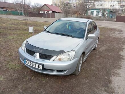 Сірий Міцубісі Lancer, об'ємом двигуна 1.6 л та пробігом 197 тис. км за 5100 $, фото 1 на Automoto.ua