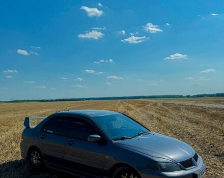 Серый Мицубиси Лансер, объемом двигателя 1.6 л и пробегом 280 тыс. км за 4000 $, фото 1 на Automoto.ua