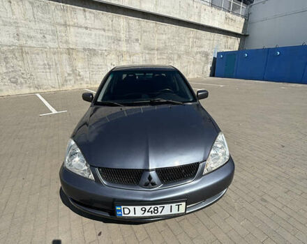 Сірий Міцубісі Lancer, об'ємом двигуна 1.6 л та пробігом 251 тис. км за 3900 $, фото 1 на Automoto.ua