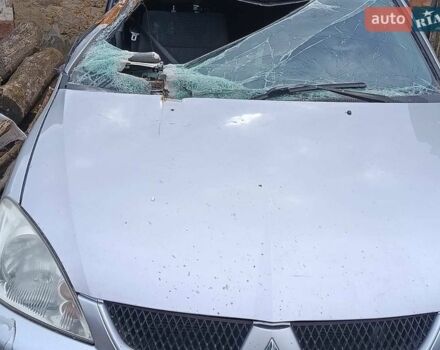 Серый Мицубиси Лансер, объемом двигателя 1.58 л и пробегом 159 тыс. км за 1800 $, фото 1 на Automoto.ua