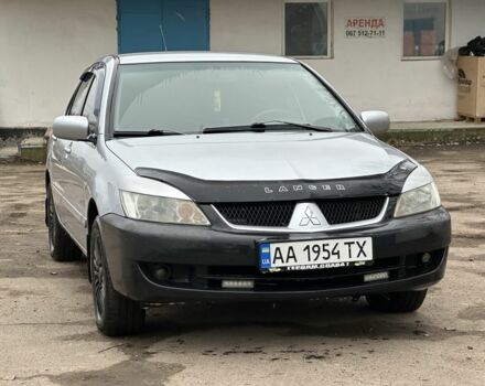 Сірий Міцубісі Lancer, об'ємом двигуна 1.6 л та пробігом 298 тис. км за 3600 $, фото 1 на Automoto.ua