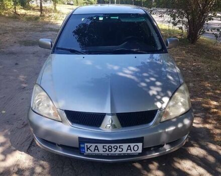 Серый Мицубиси Лансер, объемом двигателя 1.6 л и пробегом 236 тыс. км за 4500 $, фото 1 на Automoto.ua