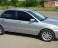 Сірий Міцубісі Lancer, об'ємом двигуна 1.6 л та пробігом 149 тис. км за 6500 $, фото 1 на Automoto.ua