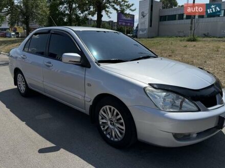 Мицубиси Лансер 2007 в Каменское - Днепродзержинск на Automoto.ua Серый Мицубиси Лансер, объемом двигателя 1.6 л и пробегом 220 тыс. км за 5400 $, фото 1 на Automoto.ua