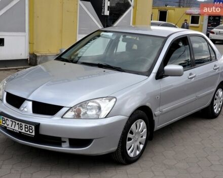 Серый Мицубиси Лансер, объемом двигателя 1.58 л и пробегом 199 тыс. км за 3400 $, фото 1 на Automoto.ua