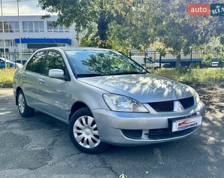 Сірий Міцубісі Lancer, об'ємом двигуна 1.58 л та пробігом 138 тис. км за 4990 $, фото 1 на Automoto.ua