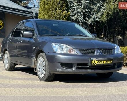 Серый Мицубиси Лансер, объемом двигателя 1.6 л и пробегом 139 тыс. км за 5600 $, фото 1 на Automoto.ua
