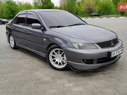 Мицубиси Лансер 2007 в Днепре (Днепропетровске) на Automoto.ua Серый Мицубиси Лансер, объемом двигателя 1.6 л и пробегом 130 тыс. км за 7500 $, фото 1 на Automoto.ua