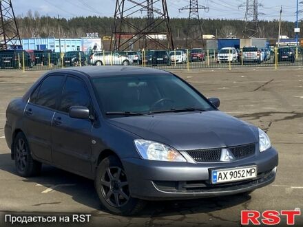 Сірий Міцубісі Lancer, об'ємом двигуна 1.6 л та пробігом 260 тис. км за 3700 $, фото 1 на Automoto.ua