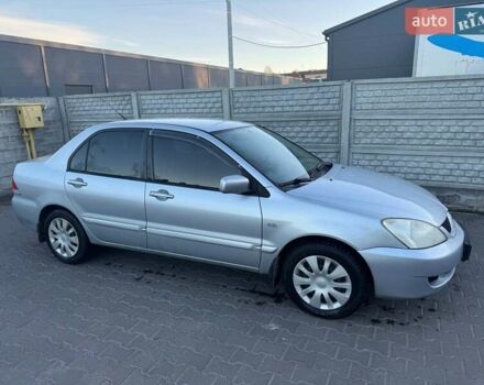 Сірий Міцубісі Lancer, об'ємом двигуна 1.6 л та пробігом 256 тис. км за 4500 $, фото 1 на Automoto.ua