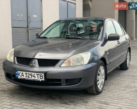 Серый Мицубиси Лансер, объемом двигателя 1.58 л и пробегом 225 тыс. км за 4200 $, фото 1 на Automoto.ua
