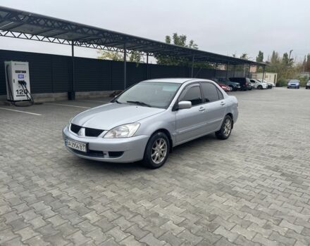 Сірий Міцубісі Lancer, об'ємом двигуна 1.6 л та пробігом 299 тис. км за 4395 $, фото 1 на Automoto.ua