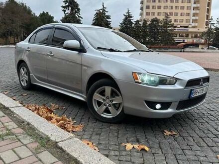 Сірий Міцубісі Lancer, об'ємом двигуна 2 л та пробігом 221 тис. км за 6300 $, фото 1 на Automoto.ua