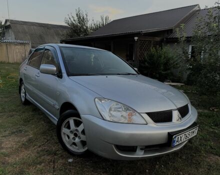 Сірий Міцубісі Lancer, об'ємом двигуна 1.6 л та пробігом 286 тис. км за 3998 $, фото 1 на Automoto.ua