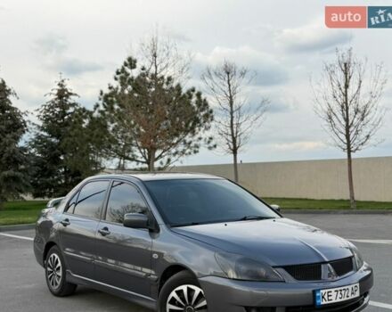 Серый Мицубиси Лансер, объемом двигателя 1.58 л и пробегом 194 тыс. км за 4900 $, фото 1 на Automoto.ua