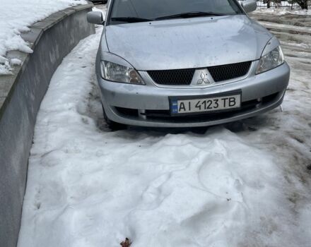 Серый Мицубиси Лансер, объемом двигателя 1.6 л и пробегом 273 тыс. км за 2700 $, фото 1 на Automoto.ua