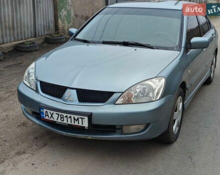 Сірий Міцубісі Lancer, об'ємом двигуна 1.58 л та пробігом 306 тис. км за 3400 $, фото 1 на Automoto.ua