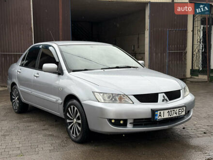 Міцубісі Lancer 2007 у Новом Буге на Automoto.ua Сірий Міцубісі Lancer, об'ємом двигуна 1.58 л та пробігом 278 тис. км за 3650 $, фото 1 на Automoto.ua
