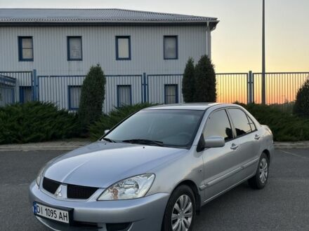Сірий Міцубісі Lancer, об'ємом двигуна 1.6 л та пробігом 300 тис. км за 3700 $, фото 1 на Automoto.ua