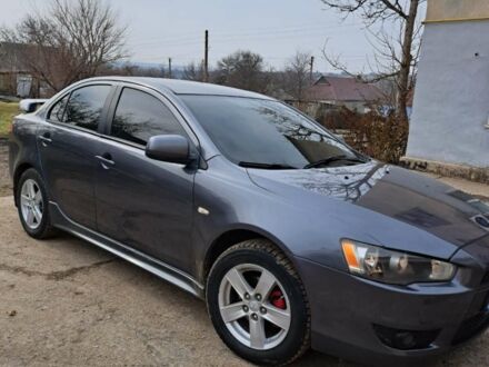 Сірий Міцубісі Lancer, об'ємом двигуна 2 л та пробігом 223 тис. км за 6700 $, фото 1 на Automoto.ua
