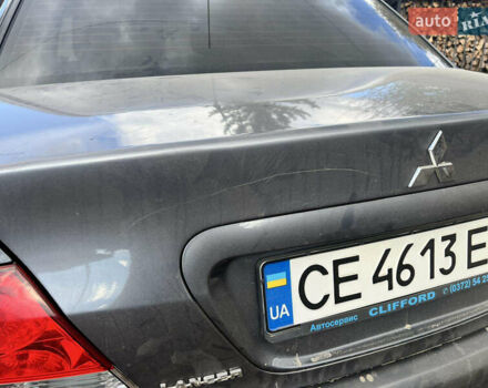 Серый Мицубиси Лансер, объемом двигателя 1.6 л и пробегом 222 тыс. км за 4200 $, фото 1 на Automoto.ua