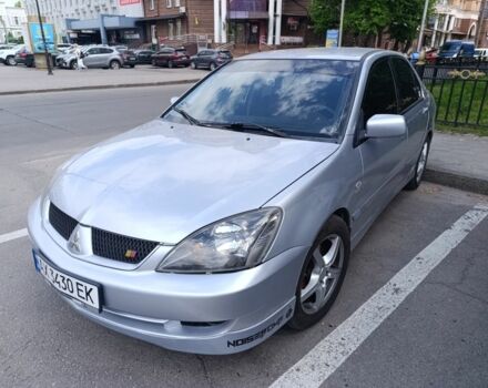 Сірий Міцубісі Lancer, об'ємом двигуна 2 л та пробігом 194 тис. км за 5898 $, фото 1 на Automoto.ua