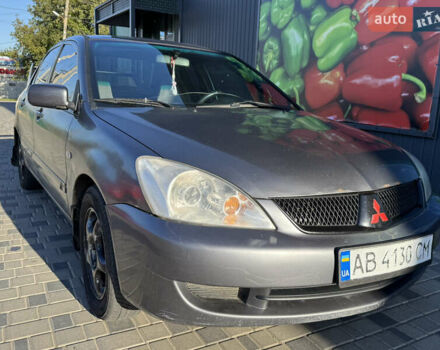 Сірий Міцубісі Lancer, об'ємом двигуна 1.58 л та пробігом 341 тис. км за 2200 $, фото 1 на Automoto.ua