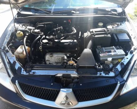 Сірий Міцубісі Lancer, об'ємом двигуна 1.6 л та пробігом 292 тис. км за 2000 $, фото 1 на Automoto.ua
