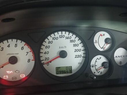 Сірий Міцубісі Lancer, об'ємом двигуна 1.58 л та пробігом 100 тис. км за 5700 $, фото 1 на Automoto.ua