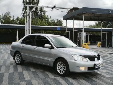 Сірий Міцубісі Lancer, об'ємом двигуна 1.6 л та пробігом 350 тис. км за 3897 $, фото 1 на Automoto.ua