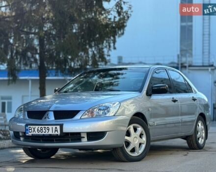 Серый Мицубиси Лансер, объемом двигателя 1.3 л и пробегом 160 тыс. км за 5222 $, фото 1 на Automoto.ua