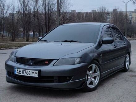 Сірий Міцубісі Lancer, об'ємом двигуна 1.6 л та пробігом 130 тис. км за 7500 $, фото 1 на Automoto.ua