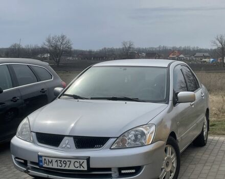 Серый Мицубиси Лансер, объемом двигателя 1.6 л и пробегом 206 тыс. км за 3399 $, фото 1 на Automoto.ua