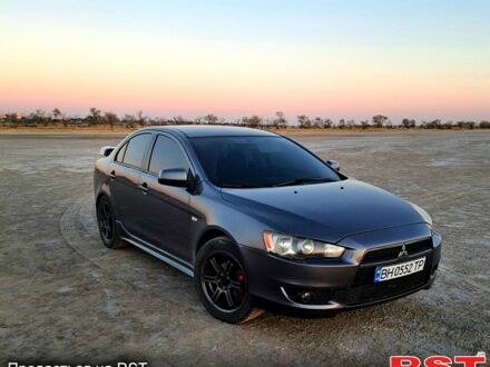 Сірий Міцубісі Lancer, об'ємом двигуна 2 л та пробігом 215 тис. км за 7300 $, фото 1 на Automoto.ua