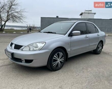 Серый Мицубиси Лансер, объемом двигателя 1.59 л и пробегом 350 тыс. км за 4000 $, фото 1 на Automoto.ua