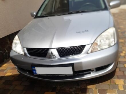 Сірий Міцубісі Lancer, об'ємом двигуна 1.5 л та пробігом 176 тис. км за 2850 $, фото 1 на Automoto.ua