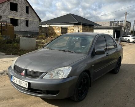 Сірий Міцубісі Lancer, об'ємом двигуна 1.6 л та пробігом 200 тис. км за 2300 $, фото 1 на Automoto.ua