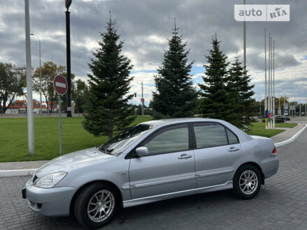 Сірий Міцубісі Lancer, об'ємом двигуна 1.6 л та пробігом 204 тис. км за 5250 $, фото 1 на Automoto.ua