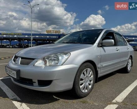 Сірий Міцубісі Lancer, об'ємом двигуна 1.59 л та пробігом 288 тис. км за 4500 $, фото 1 на Automoto.ua